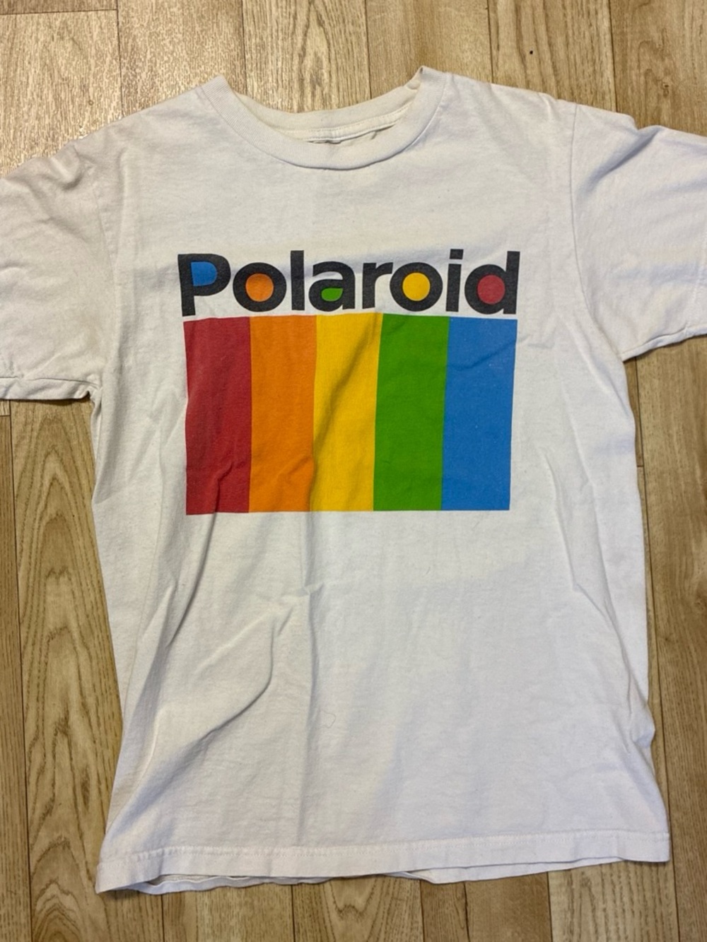 Polaroid White Tee with Red Orange Yellow Green Blue Stripe Logo